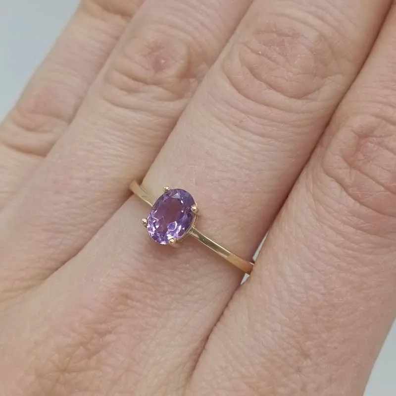 Anillo oro garras piedra amatista