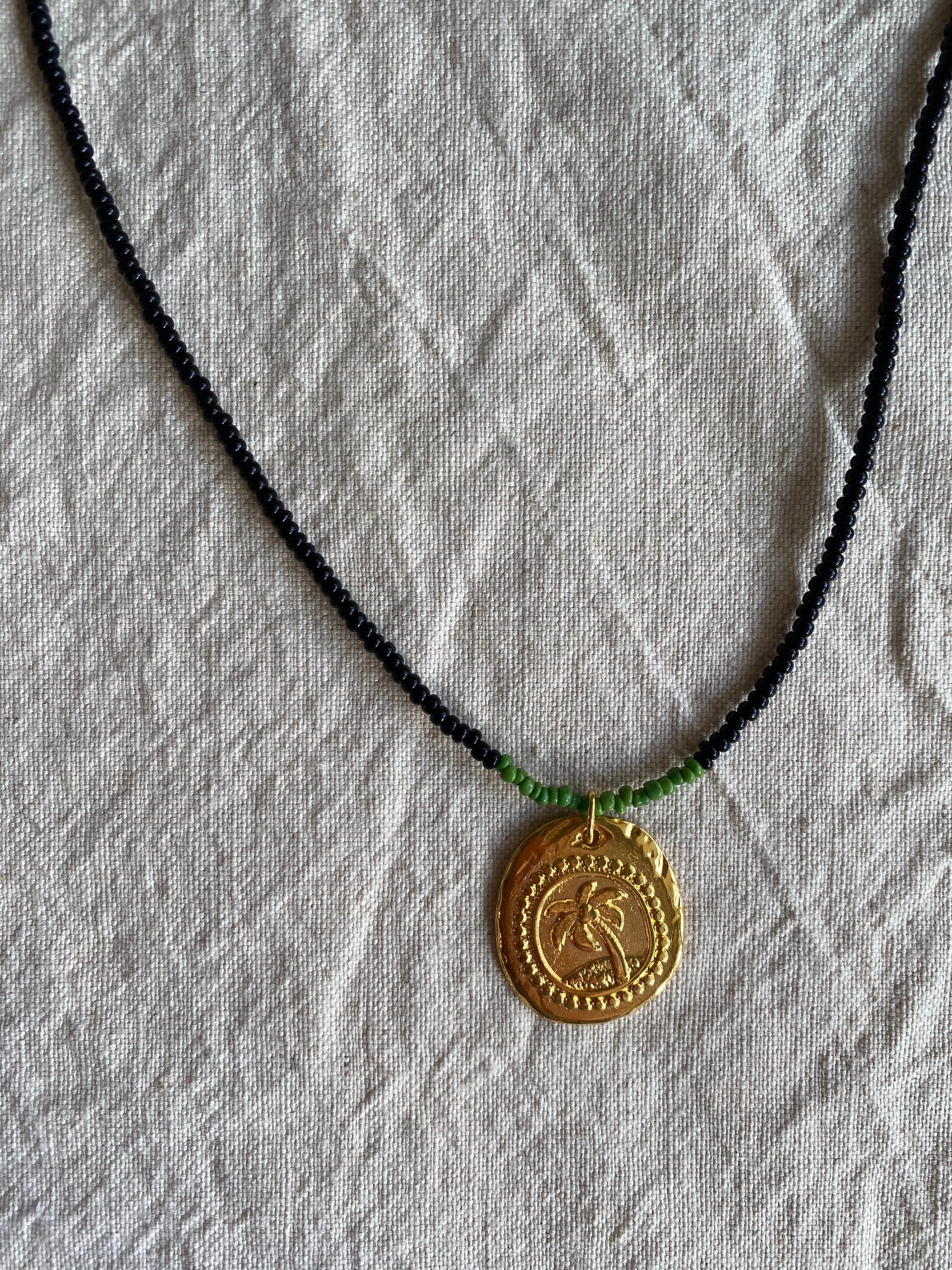 Collar Palmier by night