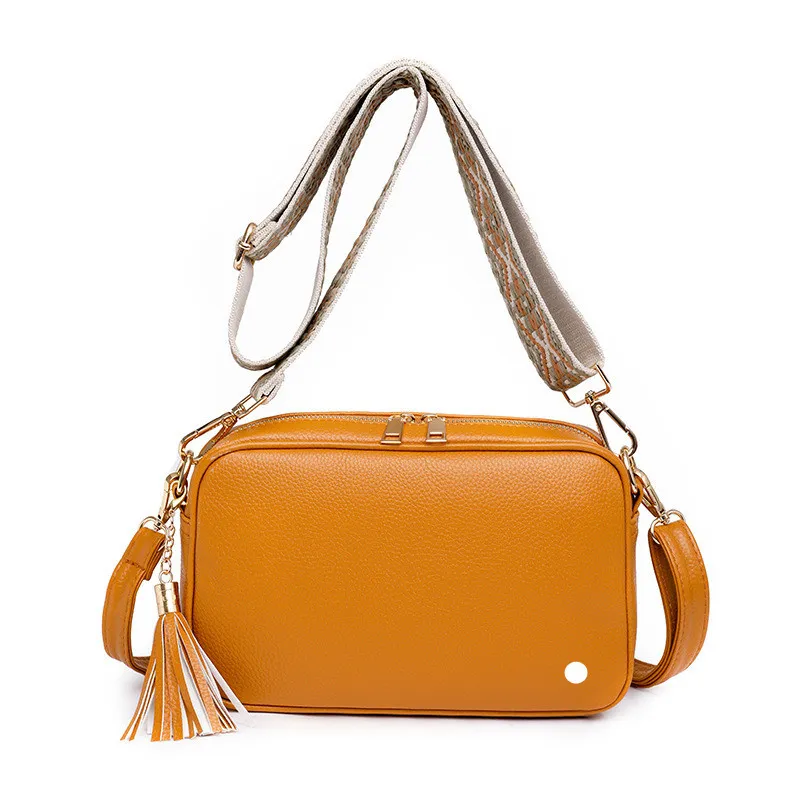 Lu Bolsos De Mujer bolsos de tendencia púrpura Simple cremallera diseño de borla bolso de mensajero bolsos pequeños femeninos bo