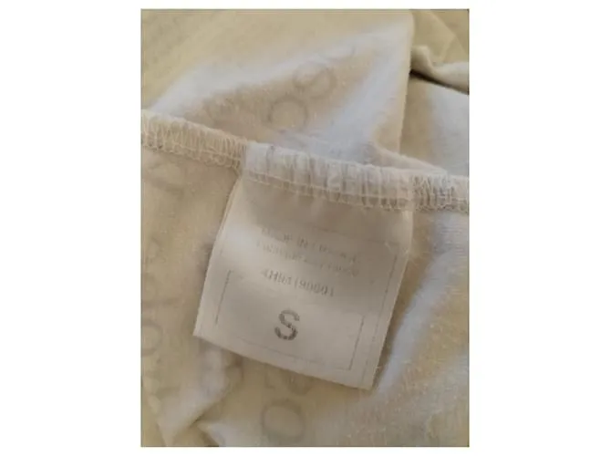 Papel periódico estampado blanco John Galliano 
