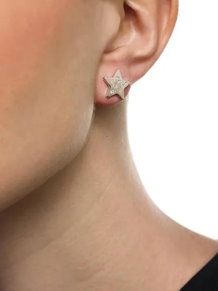 pendientes guess estrella logo