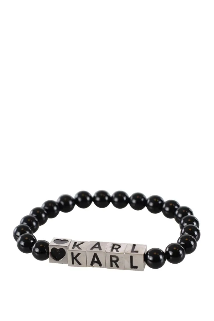 Pulsera negra con letras